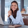 i-love-what-i-cropped-portrait-attractive-young-businesswoman-working-her-laptop-while-sitting-office_590464-62606